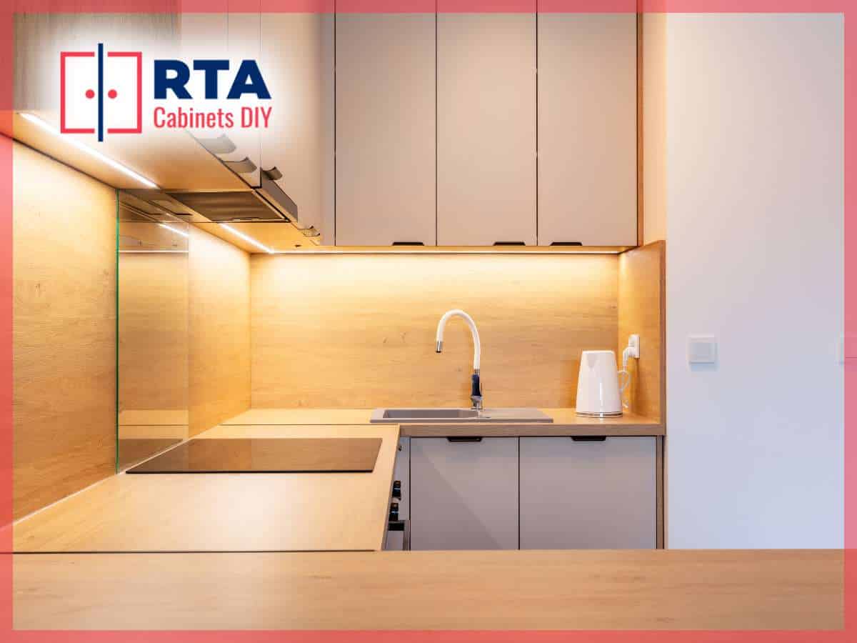 Hand opening a cabinet door, showcasing RTA cabinets in use